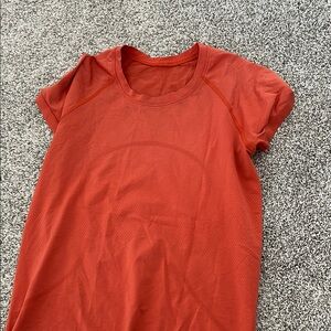 Women's LULULEMON orange tee